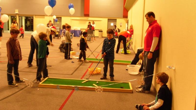 golf carnival game and kids playing