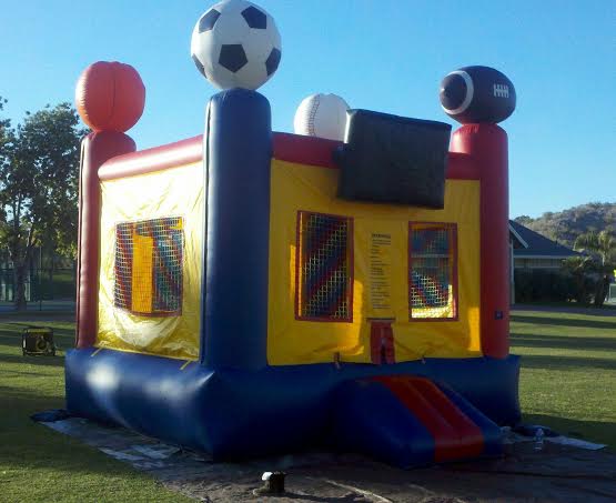 Sports bounce house with basketball hoop